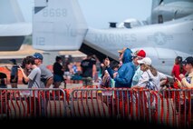 Beale Air & Space Expo attendees take photos during aerial performances at Beale Air Force Base, California, June 7, 2025.