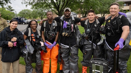 The 33rd Weapons of Mass Destruction Civil Support Team Survey Section pose for a photo during a full-scale chemical, biological, radiological, nuclear and explosive exercise at Joint Base Andrews, Md., May 21, 2025. The Survey Section performed the site investigation, documentation and decontamination portions of the exercise.