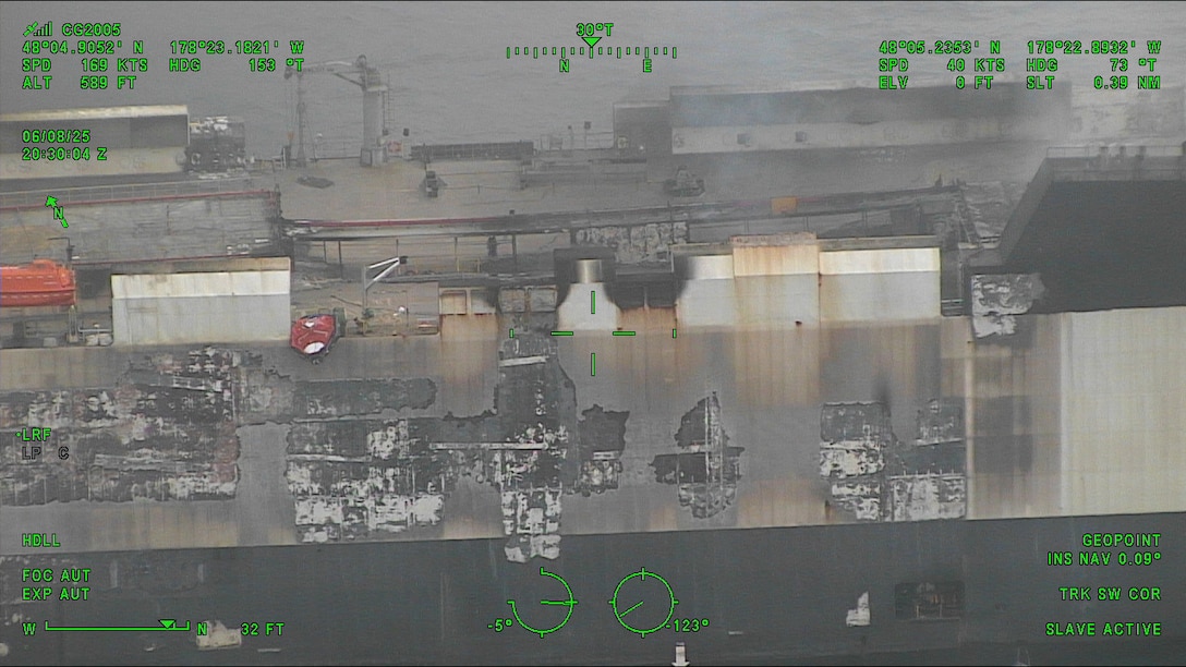 A Coast Guard C-130J Super Hercules aircrew from Coast Guard Air Station Kodiak conducts an overflight of a fire aboard the cargo vessel Morning Midas approximately 260 miles southwest of Adak, June 8, 2025. The Coast Guard is in close communication with Zodiac Maritime, the manager of the Morning Midas, as they develop their salvage and safety plans with Resolve Marine. (U.S. Coast Guard photo courtesy of Air Station Kodiak)