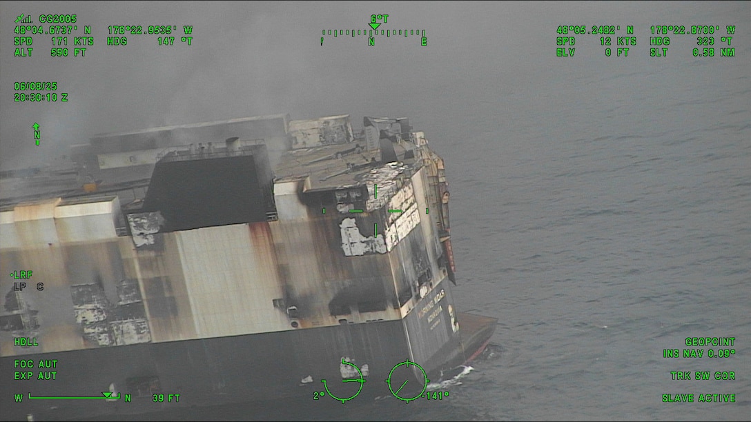 A Coast Guard C-130J Super Hercules aircrew from Coast Guard Air Station Kodiak conducts an overflight of a fire aboard the cargo vessel Morning Midas approximately 260 miles southwest of Adak, June 8, 2025. The Coast Guard is in close communication with Zodiac Maritime, the manager of the Morning Midas, as they develop their salvage and safety plans with Resolve Marine. (U.S. Coast Guard photo courtesy of Air Station Kodiak)