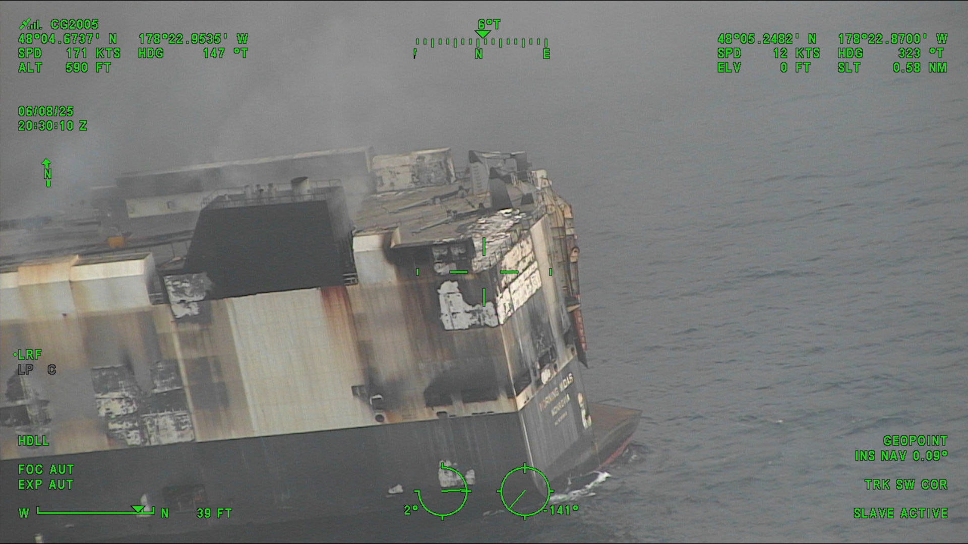 A Coast Guard C-130J Super Hercules aircrew from Coast Guard Air Station Kodiak conducts an overflight of a fire aboard the cargo vessel Morning Midas approximately 260 miles southwest of Adak, June 8, 2025. The Coast Guard is in close communication with Zodiac Maritime, the manager of the Morning Midas, as they develop their salvage and safety plans with Resolve Marine. (U.S. Coast Guard photo courtesy of Air Station Kodiak)