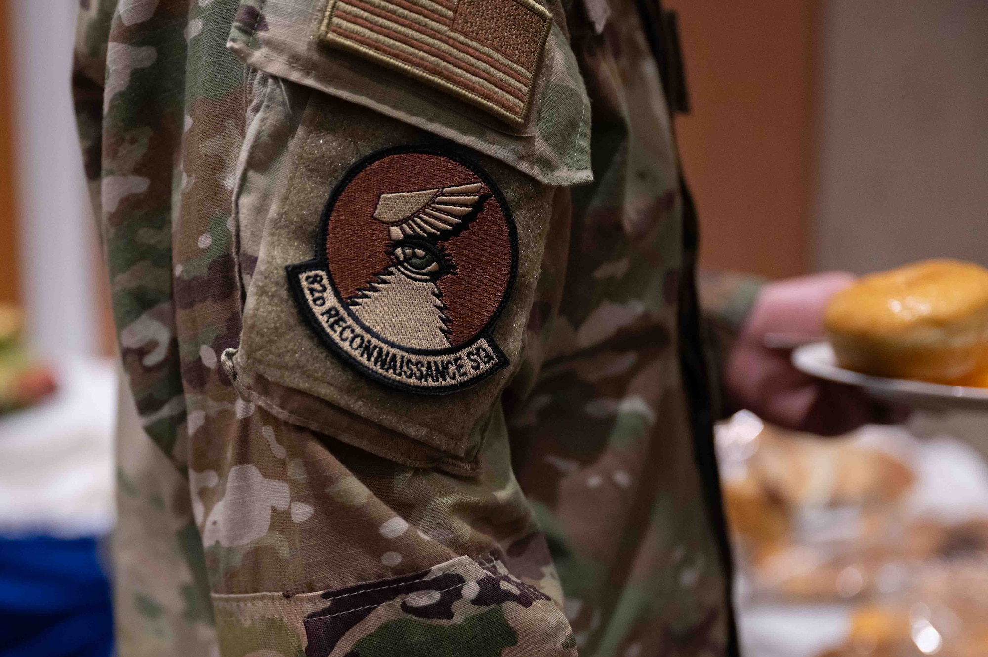 A patch is on an airman.