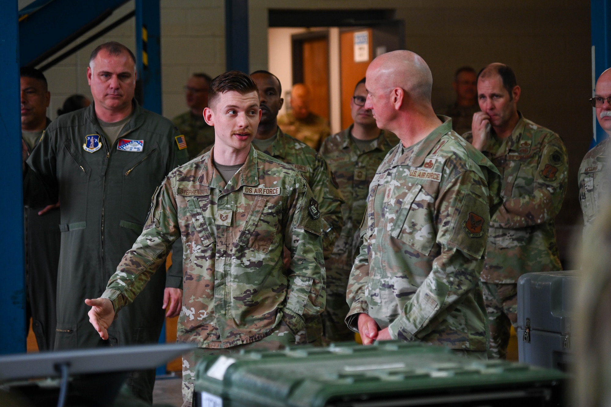 Service members attend a brief.