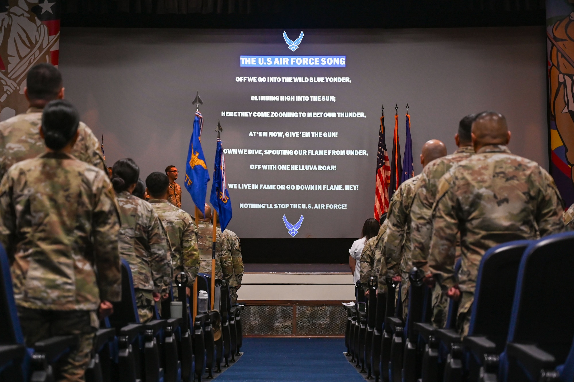 U.S. Air Force Airmen from the Guam Air National Guard sing the Air Force Song in unison during a flight activation ceremony on Andersen Air Force Base, Guam, June 7, 2025.
