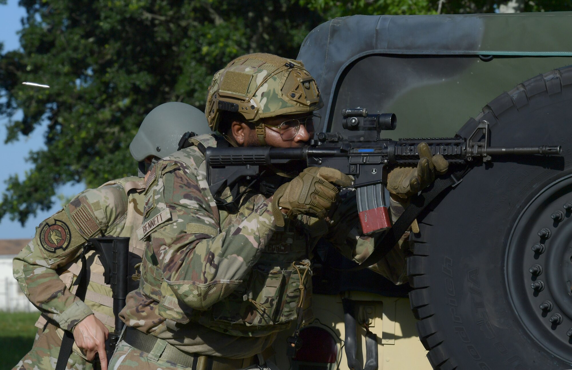 Senior Airman Tyron Bennett, 81st Security Forces Squadron visitors center control clerk, participates in shoot, move and communicate tactics during Warrior Day