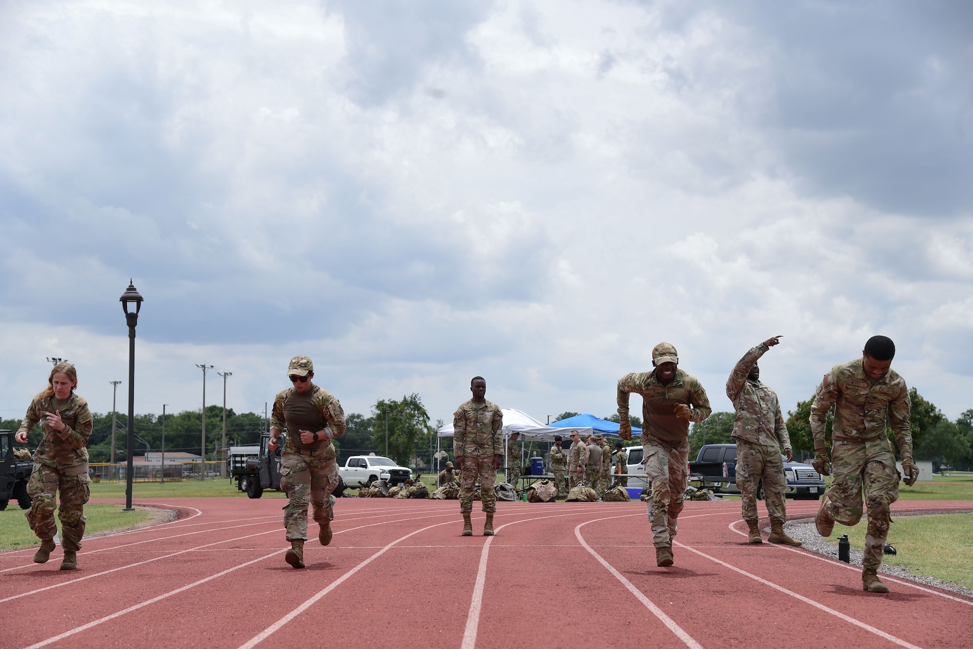 Service members participate in combat agility drills during Warrior Day