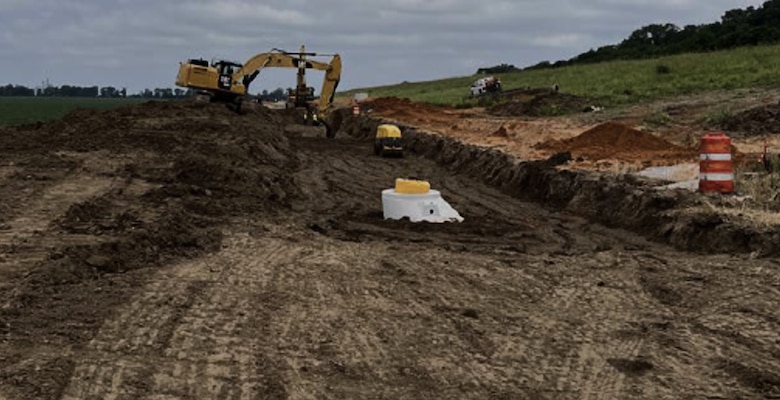Project Managers Jason Dickard, P.E., and Jase Ray, E.I. and their project delivery team successfully completed the Island 8 Parcel 2, Seepage Remediation Project in partnership with Fulton County, Kentucky Board of Levee Commissioners, and contractor Jerry B. Young Construction, May 30, 2025.   

The  Island 8 Parcel 2, Seepage Remediation Project ensures the integrity of the Mississippi River levee embankment during flood events, reducing the risks to both life safety and property in Fulton County, Kentucky, as well as surrounding communities, including Lake County, Obion County and Dyer County, Tennessee. 

The project installed 79 relief wells discharging into 12,000 linear feet of subsurface piping, 1900 linear feet of new drainage ditches, five culvert replacements, and executed 1.6 miles of clearing along Running Slough. 

The newly installed relief wells prevent levee underseepage and sand boils by collecting and draining the water in a safe, controlled manner.