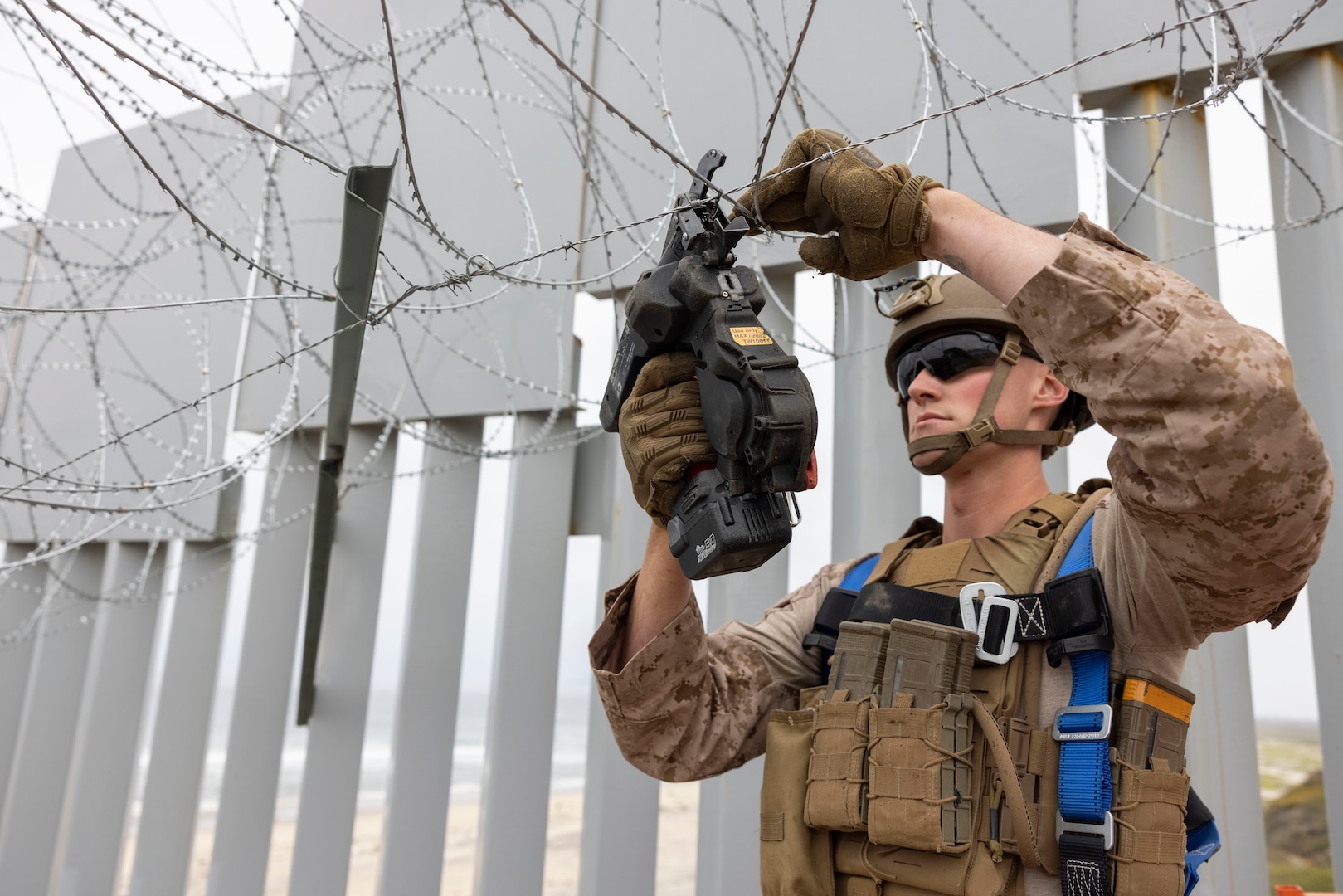 Marines securing concertina wire