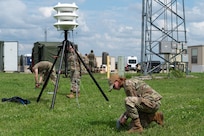 Airmen assigned to the 155th Air Refueling Wing secure a Blue Sky Mast System at the Nebraska National Guard air base in Lincoln, Nebraska, June 6, 2025.