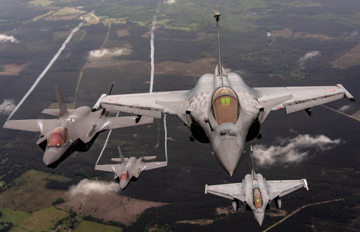 Two U.S. Air Force F-35A Lightning IIs assigned to the 4th Fighter Squadron, Hill Air Force Base, Utah, and two Dassault Rafales assigned to the 1/4 Gascogne Fighter Squadron, 113 Saint-Dizier-Robinson air base, France, break formation during flight May 18, 2021 over France. The flight was a part of the Atlantic Trident 21 exercise which is a joint, multinational exercise involving service members from the U.S., France and the U.K., and is aimed at enhancing fourth and fifth generation integration, combat readiness and fighting capabilities, through conducting complex air operations in a contested multinational joint force environment.