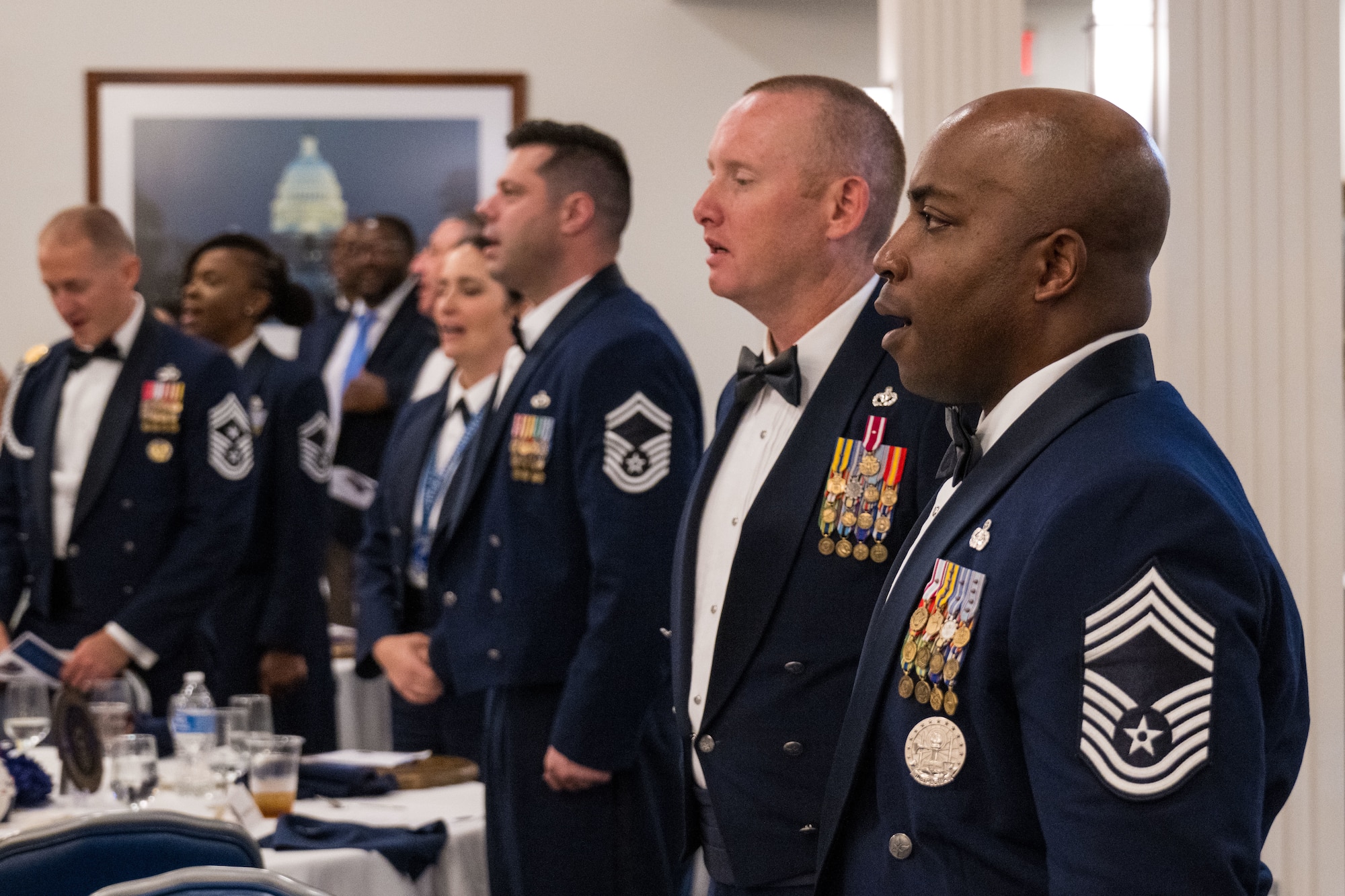 Chiefs sing the Air Force song to end the Chief Recognition Ceremony.