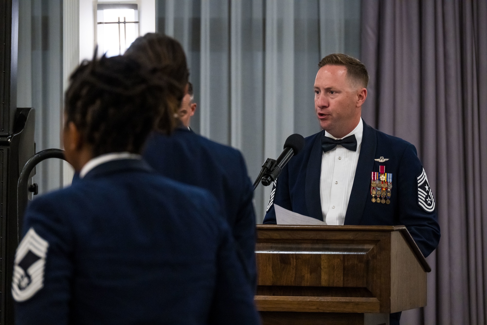 Chief Master Sgt. Helms gives the Chief's Charge to end the Chief Recognition Ceremony.