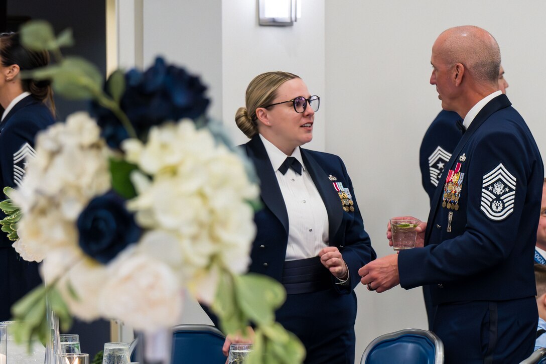The Chief Master Sgt. of the Air Force, David Flosi, speaks with MSgt Deana Heitzman.