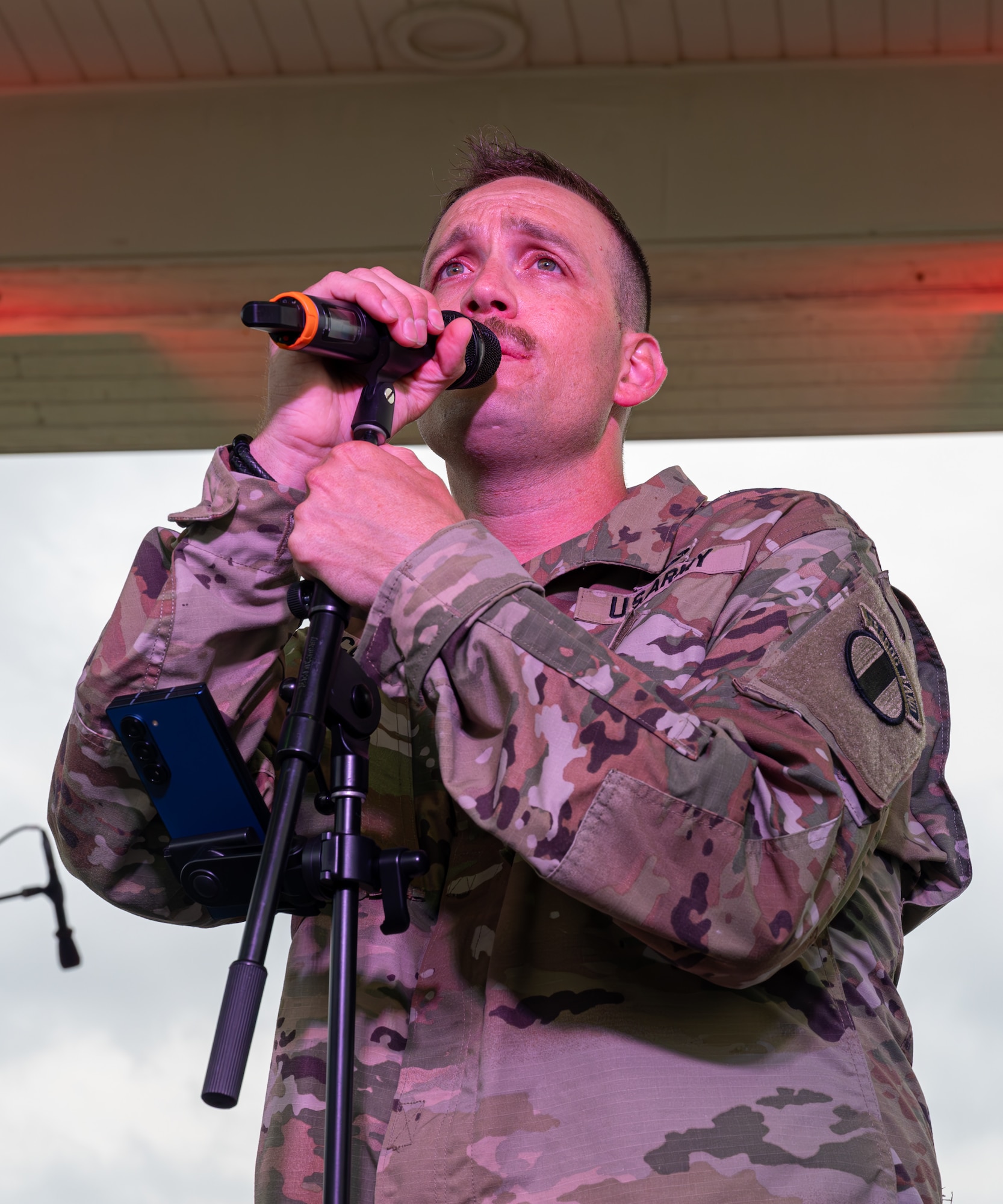 Staff. Sgt. Jeffery McCormick sings.