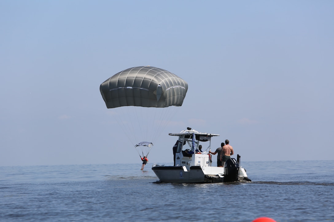 U.S. Army soldiers assigned to the 478th Civil Affairs Battalion, and paratroopers assigned to the British 4th Battalion, conduct land and water airborne operations during Lagoon Leap 2025, in Homestead Air Base and a Deliberate Water Jump into Lake Okeechobee Fla., May 14-16th, 2025. (U.S. Army Photo by Mark Rankin)