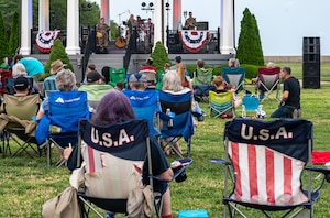 Members of the Hampton-Roads community watch the U.S. Army Training Doctrine and Command Rock Band perform.