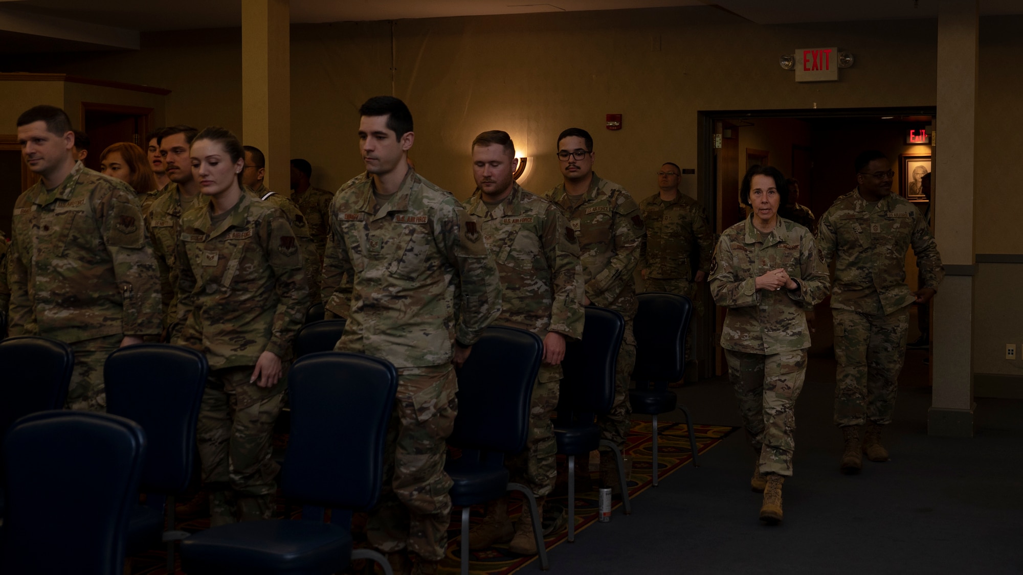 Maj. Gen. Jeannine Ryder, Air Force Medical Readiness Command-Bravo commander and CMSgt Jerry Dunn, Medical Readiness Command-Bravo command chief, walk into a town hall briefing at Grand Forks Air Force Base, N.D., June 3, 2025.
