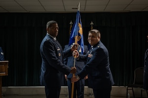 Airmen from the 47th Communications Squadron (CS) gathered at XL Landings to witness a transition of leadership as Lt. Col. Elmer Lustina relinquished command to Maj. Anthony Dimuzio during a change of command ceremony, June 9, 2025.