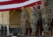 U.S. Air Force Col. Jesse Lamarand, 5th Bomb Wing commander, Col. Rofelio Grinston, 5th Maintenance Group (5MXG) commander, and Col. Tiffany Arnold, incoming 5MXG commander, stand at attention during the 5MXG change of command ceremony at Minot Air Force Base, North Dakota, June 4, 2025. During the ceremony, Grinston relinquished command to Col. Jesse Lamarand. (U.S. Air Force photo by Senior Airman Alex Nottingham)