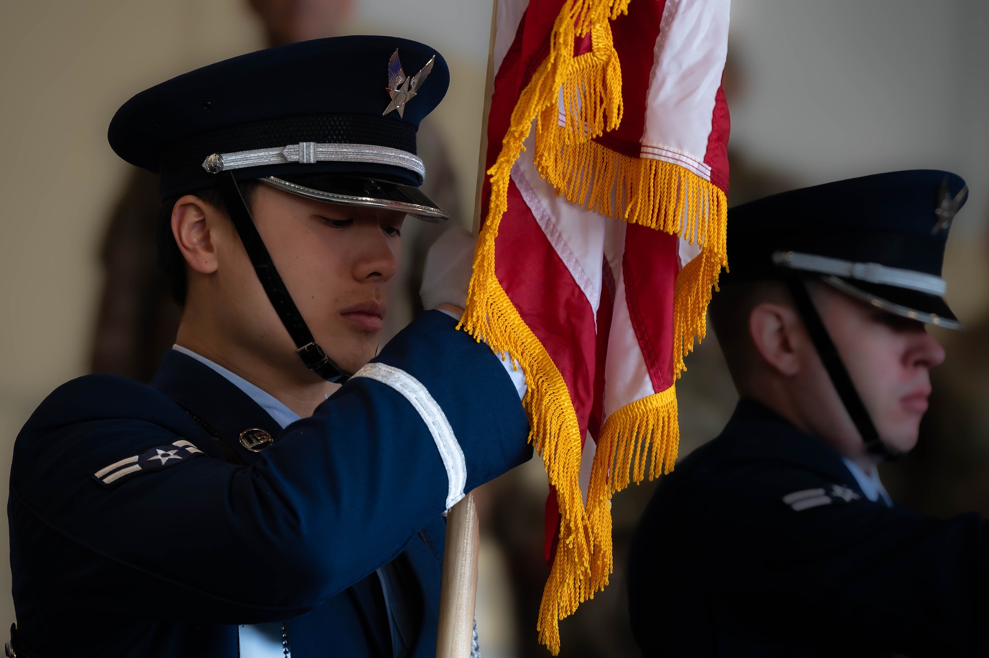 Senior Airman Starney Liu, Team Minot honor guardsmen, holds the American during the National anthem during the 5th Maintenance Group change of command ceremony at Minot Air Force Base, North Dakota, June 4, 2025. The presentation of colors marked the beginning of the ceremony and it symbolizes the nation’s strength and resilience. (U.S. Air Force photo by Senior Airman Alex Nottingham)Senior Airman Starney Liu, Team Minot honor guardsmen, holds the American during the National anthem during the 5th Maintenance Group change of command ceremony at Minot Air Force Base, North Dakota, June 4, 2025. The presentation of colors marked the beginning of the ceremony and it symbolizes the nation’s strength and resilience. (U.S. Air Force photo by Senior Airman Alex Nottingham)