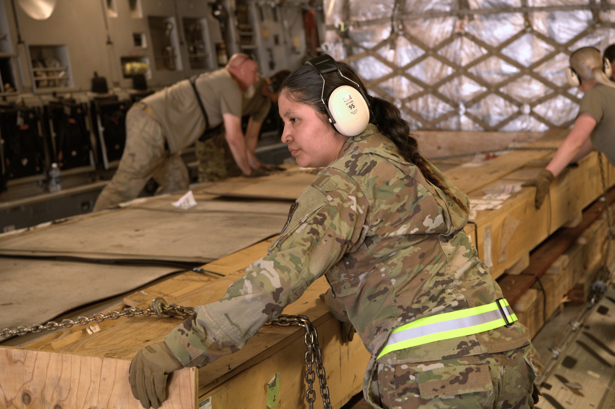 73rd Aerial Port Squadron Reserve Citizen Airman, A1C Natalia Larroza, guides a cargo pallet into position aboard a C-17 Globemaster III at Travis Air Force Base, Calif., April 14, 2025. The training supports the squadron’s mission to develop combat-ready Airmen capable of rapid global mobility.