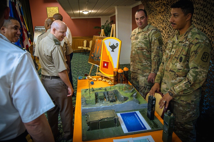 U.S. Army Cyber Center of Excellence and Fort Eisenhower hosted an Army Heritage Month celebration featuring a historical uniform presentation, workforce recognition honoring excellence in service, and guest speakers highlighting the Army’s rich history, June 6, 2025, at the Eisenhower Conference and Catering Center. The event served as a tribute to the Army’s enduring legacy and a reflection of its continued dedication to those who serve and support the mission. 