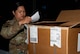 Airman 1st Class Maiejane Cuaresma, Traffic Management Office (TMO) inbound cargo technician, confirms an invoice with a delivery at Minot Air Force Base, North Dakota, Jun 3, 2025. On average, TMO ships 80 to 120 military assets a day such as aircraft parts, engines, ammunition, tires, bolts, screws, and a variety of other supplies. (U.S. Air Force Senior Airmen Alex Nottingham)
