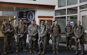 U.S.Air National Guard members assigned to the 162nd Wing gather for a hospital facilities tour at Joint Base Elmendorf-Richardson, Alaska, June 9, 2025. The two-week training event enhances clinical readiness and promotes joint integration by embedding Air National Guard personnel alongside active-duty medical teams in a real-world hospital setting. (U.S. Air National Guard photo by Staff Sgt. Guadalupe Beltran)