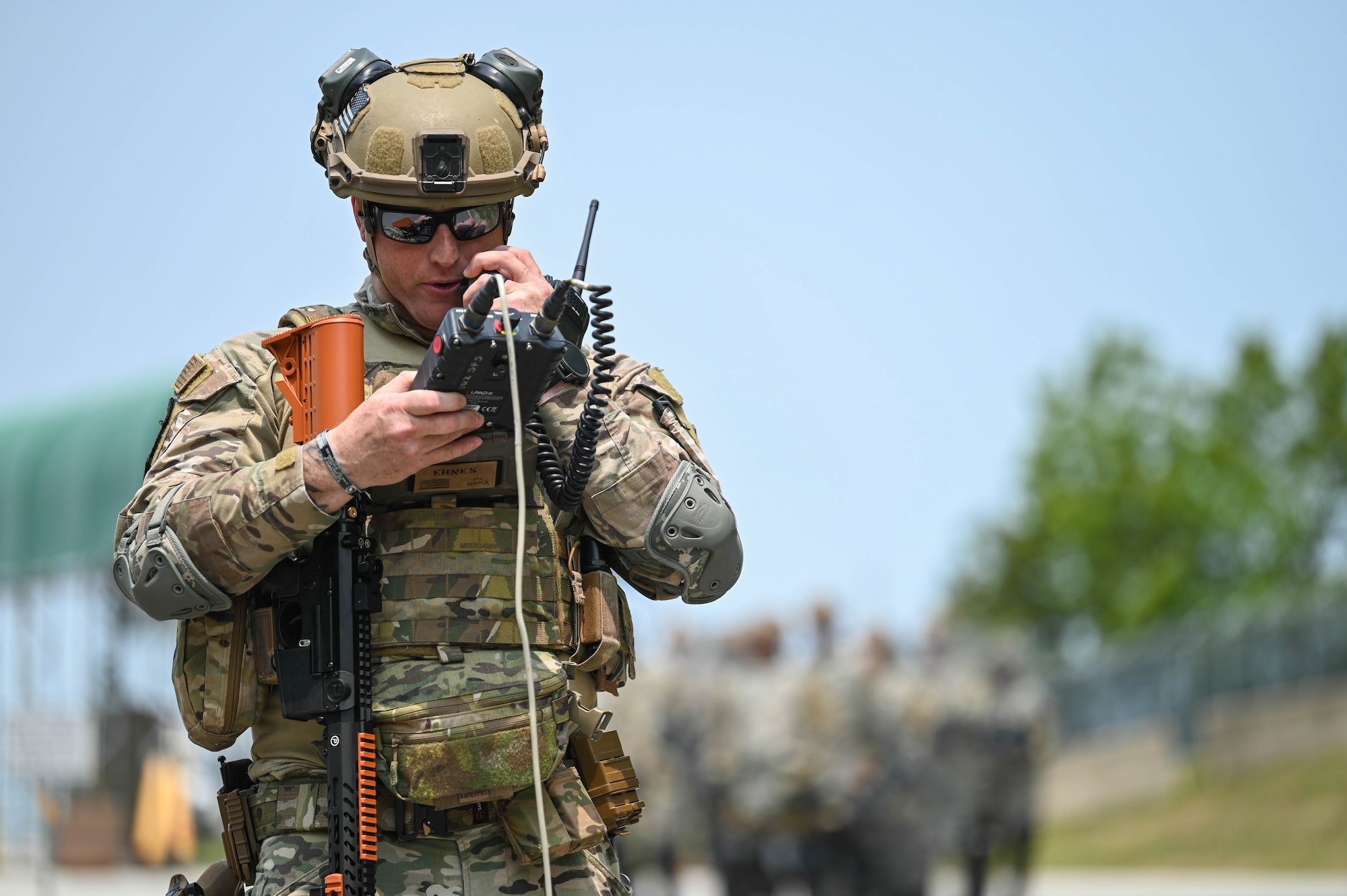 Airman speaks into LRAD.