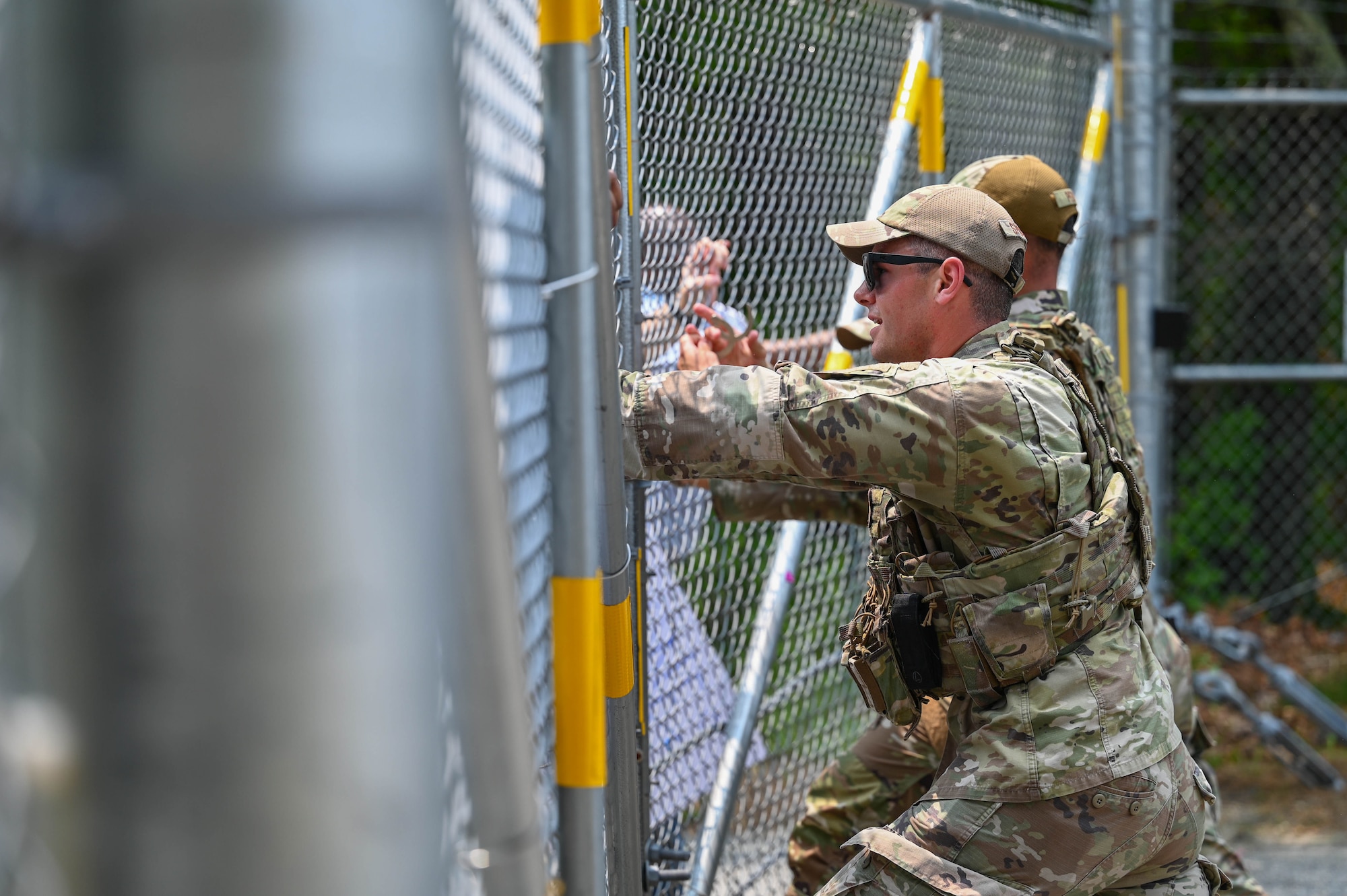 Airmen hold base gate.
