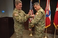 U.S. Army Maj. Gen. Phil Ryan, left, the U.S. Army South (USARSOUTH) ceremonially welcomes Chilean army Maj. Gen. Eduardo Valdivia, the incoming deputy commanding general – interoperability, during a patching ceremony in the unit’s Daniel Van Voorhis Conference Room at Fort Sam Houston, Texas, April 22, 2022.  The patching ceremony is a tradition meant to welcome incoming leaders to USARSOUTH. (U.S. Army photo by Sgt. 1st Class ShaTyra Cox)