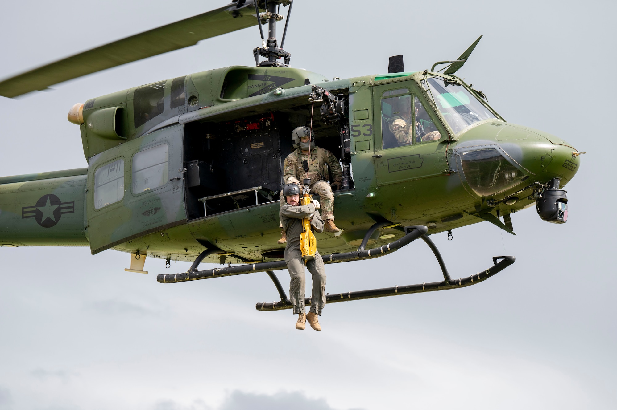 Airmen participate in hoist training.