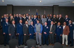 The 2025 Airlift Wing Honorary Commanders and 433rd AW Leadership assemble for a group photo after the 433rd AW 2025 Honorary Commanders’ Induction Ceremony in San Antonio, June 7, 2025.