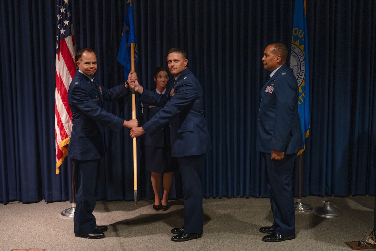Col. Manuel Colon-DeJesus, outgoing commander, 114th Medical Group, relinquished command of the 114th Medical Group to Lt. Col. Matthew Erpenbach, incoming commander, 114th Medical Group.