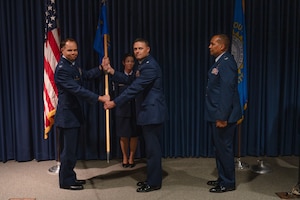 Col. Manuel Colon-DeJesus, outgoing commander, 114th Medical Group, relinquished command of the 114th Medical Group to Lt. Col. Matthew Erpenbach, incoming commander, 114th Medical Group.