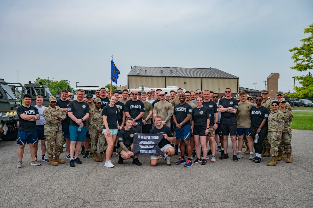 Airmen assigned to the 30th Aerial Port Squadron run the 12th Annual Port Dawg Memorial Run at Niagara Falls Air Reserve Station, New York, June 8, 2025