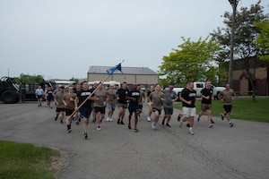 Airmen assigned to the 30th Aerial Port Squadron run the 12th Annual Port Dawg Memorial Run at Niagara Falls Air Reserve Station, New York, June 8, 2025