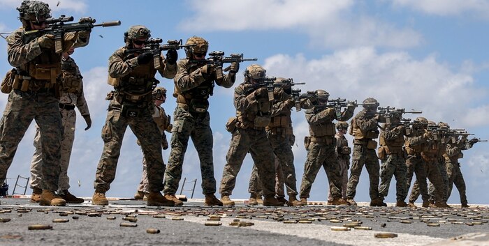 U.S. Marines with Battalion Landing Team 1/4, 31st Marine Expeditionary Unit, conduct a live-fire deck shoot aboard the amphibious transport dock ship USS Green Bay (LPD 20), in the Timor Sea, Sept. 8, 2024. The training was conducted to refine and maintain weapon familiarity and marksmanship proficiency. The 31st MEU is operating aboard ships of USS America Amphibious Ready Group in the 7th fleet area of operations to enhance interoperability with allies and partners and serve as a ready response force to defend peace and stability in the Indo-Pacific region. (U.S. Marine Corps photo by Cpl. Osmar Gutierrez)