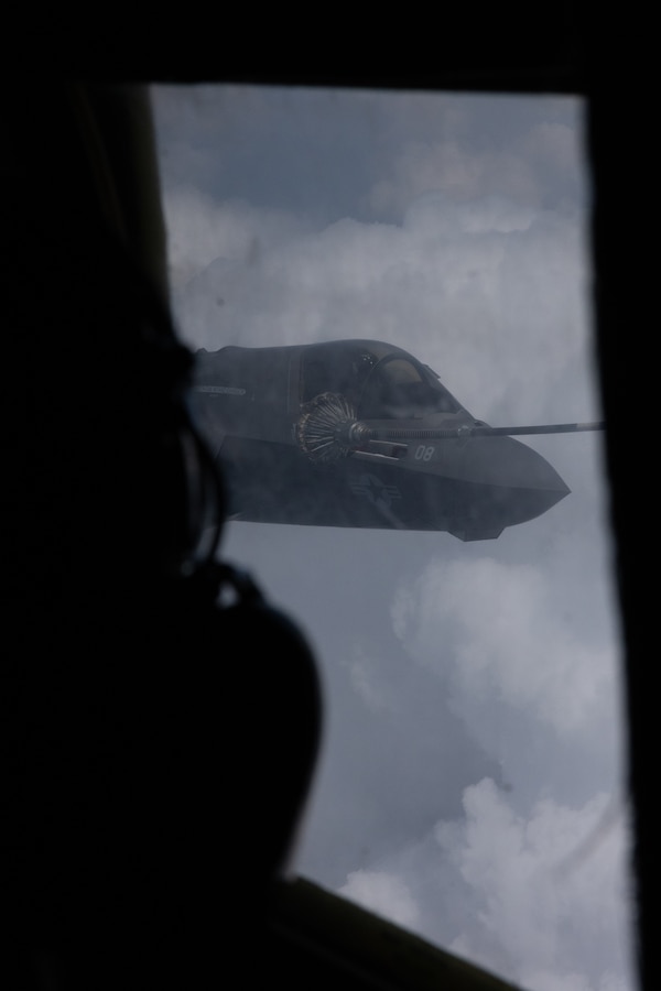 A U.S. Marine Corps F-35B Lightning II assigned to Marine Fighter Attack Squadron (VMFA) 225, Marine Aircraft Group 13, 3rd Marine Aircraft Wing receives fuel from a KC-130J Super Hercules assigned to Marine Aerial Refueler Transport Squadron (VMGR) 352, Marine Aircraft Group 11, 3rd MAW, during Exercise Sentry North in Wisconsin, June 4, 2025. The exercise provided a unique opportunity for MAW units to work alongside the joint force while practicing advanced aerial refueling techniques in an unfamiliar environment. (U.S. Marine Corps photo by Lance Cpl. Samantha Devine)