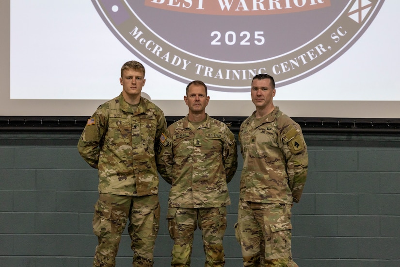 U.S. Army Spc. Syrus Butts, Kentucky State Command Sgt. Maj. Jesse Withers, and Staff Sgt. Thomas Barrett-Weber participate in an awards ceremony for the Region III Best Warrior Competition (BWC) at McCrady Training Center, Eastover, South Carolina, April 26, 2025.