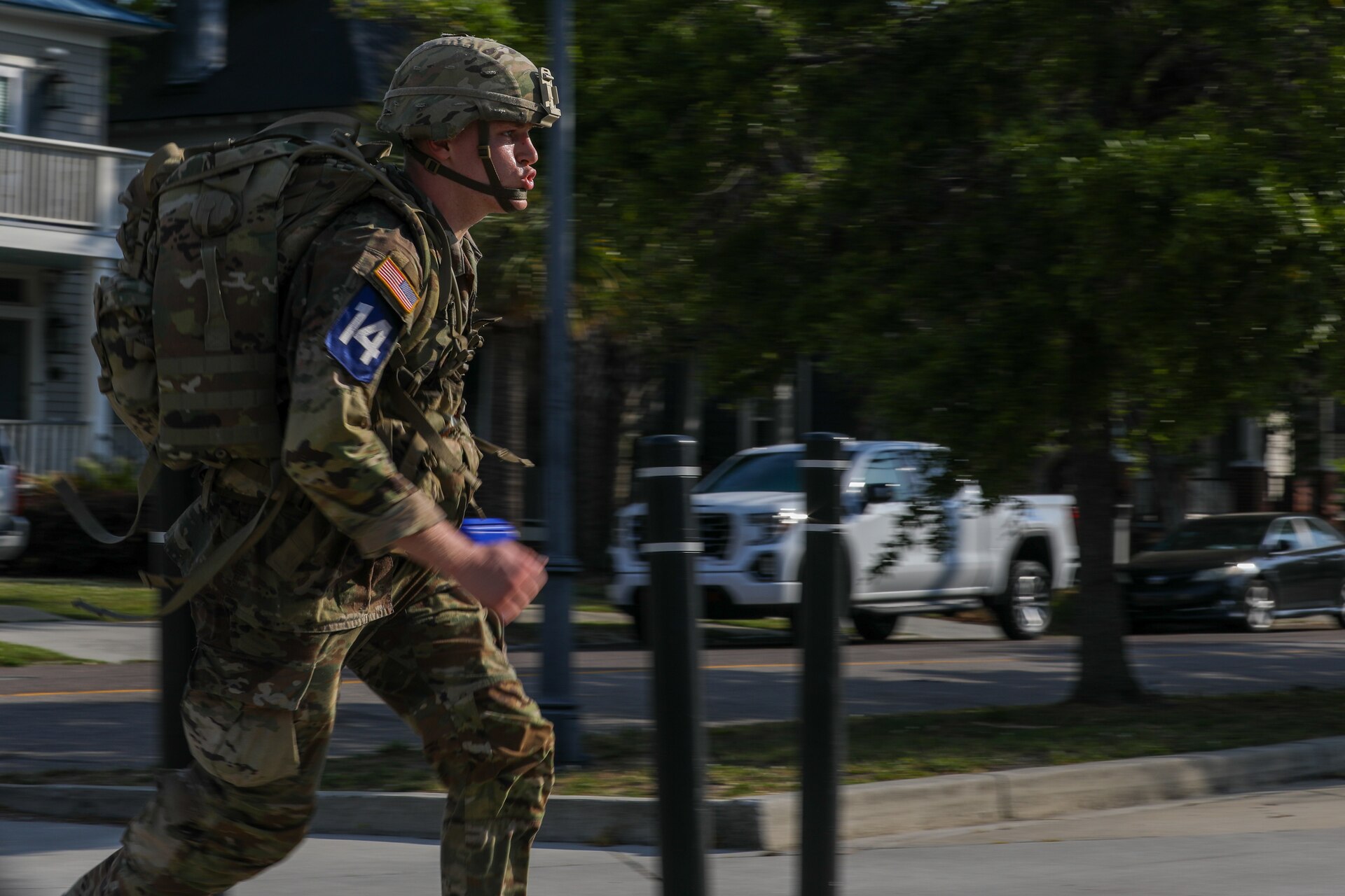 U.S. Army Spc. Syrus Butts, a cannon crewmember with Bravo Battery, 2nd Battalion, 138th Field Artillery, participates in the 12-mile ruck march of the Best Warrior Competition (BWC), Region III phase, ending at the Citadel in Charleston, South Carolina, April 23, 2025.