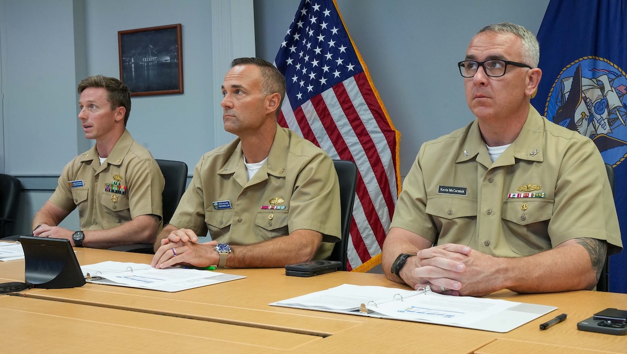 Rear Adm. Marc Williams, center, deputy commander, Navy Closure Task Force-Red Hill (NCTF-RH) provides a semi-annual update to Hawaii Gov. Josh Green’s Water Committee during a virtual meeting in Honolulu, June 6, 2025. The NCTF-RH team briefed the governor and committee members on the return of the Joint Base Pearl Harbor-Hickam drinking water distribution system to regular compliance monitoring​, and the reactivation of the Navy Aiea-Halawa drinking water shaft. Charged with the safe decommissioning of the Red Hill Bulk Fuel Storage Facility, NCTF-RH was established by the Department of the Navy as a commitment to the community and the environment. NCTF-RH continues to engage with the people of Hawaii, regulatory agencies, and other stakeholders as it safely and deliberately decommissions the facility. (U.S. Navy photo by Mass Communication Specialist 1st Class Glenn Slaughter)