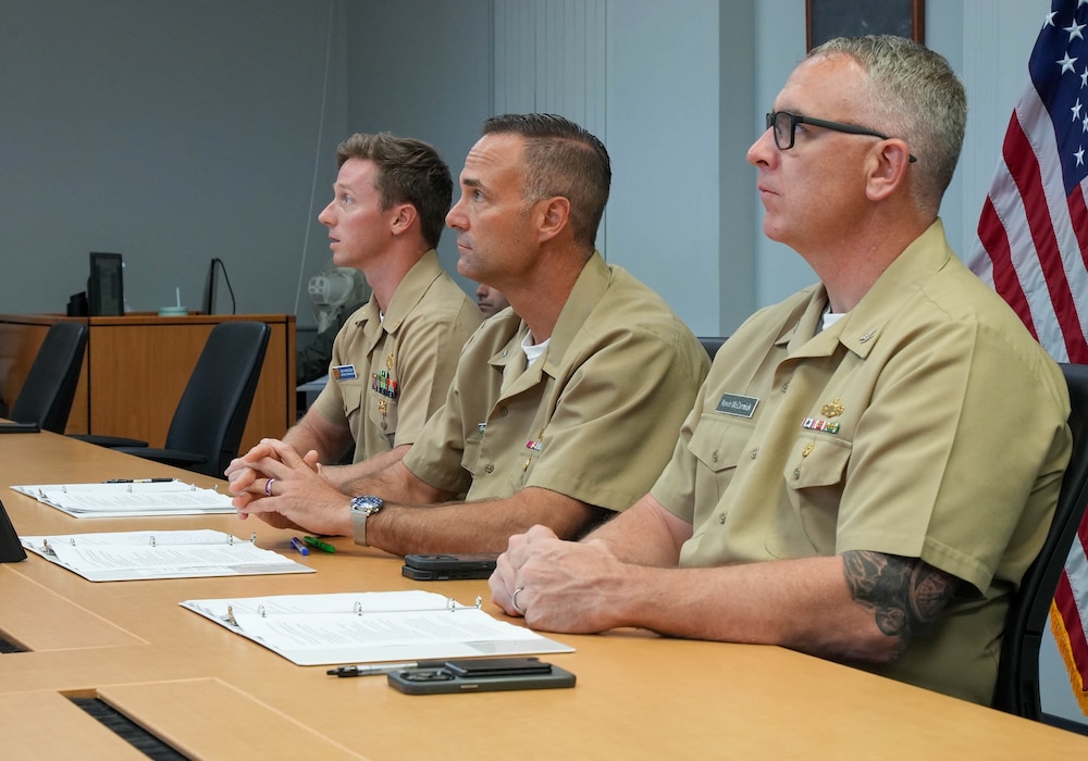 Rear Adm. Marc Williams, center, deputy commander, Navy Closure Task Force-Red Hill (NCTF-RH) provides a semi-annual update to Hawaii Gov. Josh Green’s Water Committee during a virtual meeting in Honolulu, June 6, 2025. The NCTF-RH team briefed the governor and committee members on the return of the Joint Base Pearl Harbor-Hickam drinking water distribution system to regular compliance monitoring​, and the reactivation of the Navy Aiea-Halawa drinking water shaft. Charged with the safe decommissioning of the Red Hill Bulk Fuel Storage Facility, NCTF-RH was established by the Department of the Navy as a commitment to the community and the environment. NCTF-RH continues to engage with the people of Hawaii, regulatory agencies, and other stakeholders as it safely and deliberately decommissions the facility. (U.S. Navy photo by Mass Communication Specialist 1st Class Glenn Slaughter)