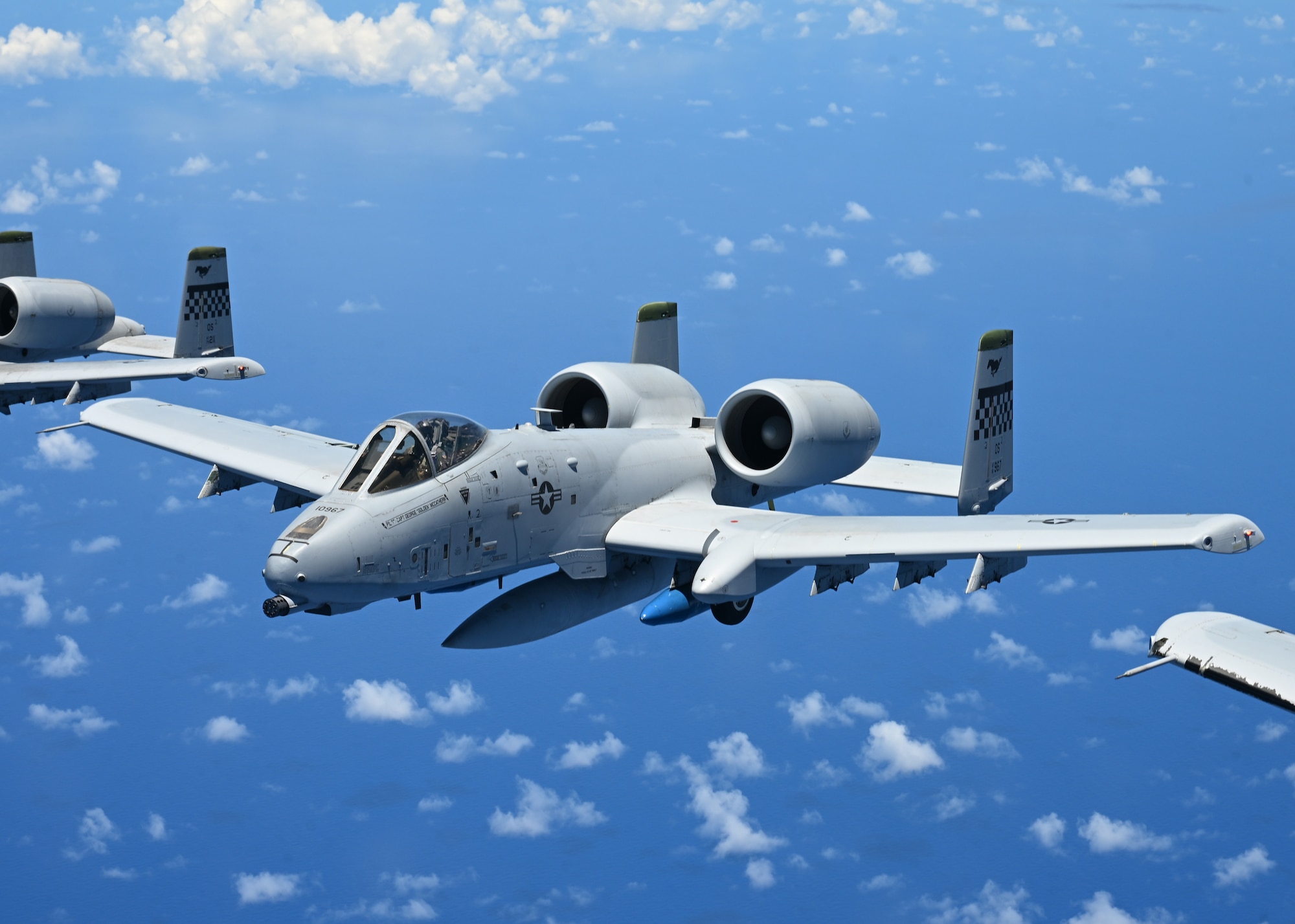 U.S. Air Force A-10 Thunderbolt II from the 25th Fighter Squadron, Osan Air Force Base, South Korea, fly in formation over Wake Island, June 7, 2025. The A-10 is a twin-engine, straight-wing, subsonic attack aircraft designed for close air support that has been flying for over 53 years.