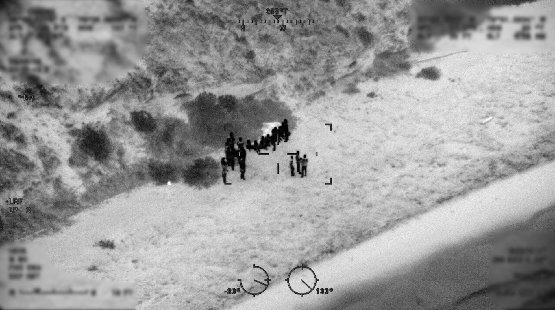 A Coast Guard Air Station Miami HC-144 Ocean Sentry aircrew flies over Anguilla Cay to deliver food, water, and supplies to stranded aliens, Friday, June 6, 2025. The crew of USCGC Walnut (WLB 205) arrived on scene and rescued 20 aliens of Cuban nationality before processing them for disposition. (U.S. Coast Guard photo)