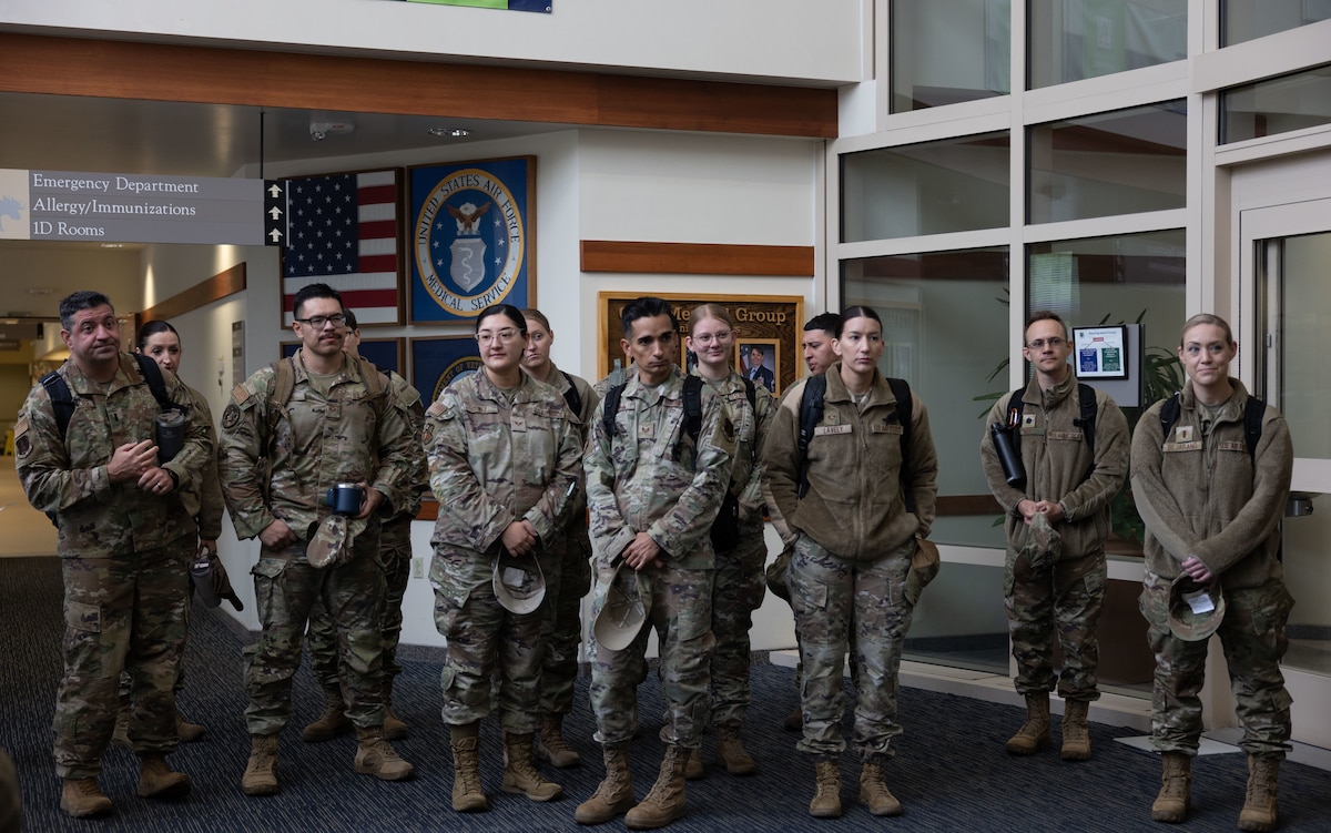 U.S.Air National Guard members assigned to the 162nd Wing gather for a hospital facilities tour at Joint Base Elmendorf-Richardson, Alaska, June 9, 2025. The two-week training event enhances clinical readiness and promotes joint integration by embedding Air National Guard personnel alongside active-duty medical teams in a real-world hospital setting. (U.S. Air National Guard photo by Staff Sgt. Guadalupe Beltran)