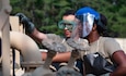 U.S. Army Reserve Staff Sgt. Brandon Johnson (left) and Spc. Asenuga Omobowale, 233rd Quartermaster Company petroleum supply specialists, maintain fuel equipment during the Quartermaster Liquid Logistics Exercise (QLLEX) at Joint Base McGuire-Dix-Lakehurst, N.J., June 5, 2025. Soldiers manned the Fuel System Supply Point during QLLEX to refuel incoming trucks for deliveries to the local area. (U.S. Air Force photo by Airman Haeleigh Bayle)