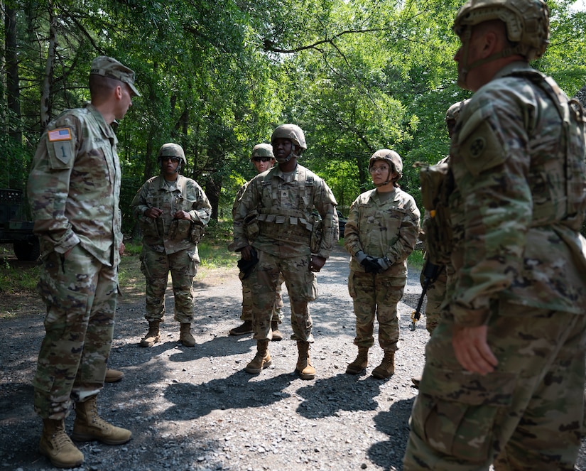 U.S. Army Reserve Soldiers assigned to the 810th Quartermaster Company interact with U.S. Army Col. Bryan Dunker (left), Joint Base McGuire-Dix-Lakehurst deputy commander and U.S. Army Support Activity commander, during the Quartermaster Liquid Logistics Exercise.