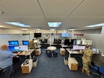 Members of the Air Force Rescue Coordination Center manage critical search and rescue missions on the operations floor on May 29, 2025.