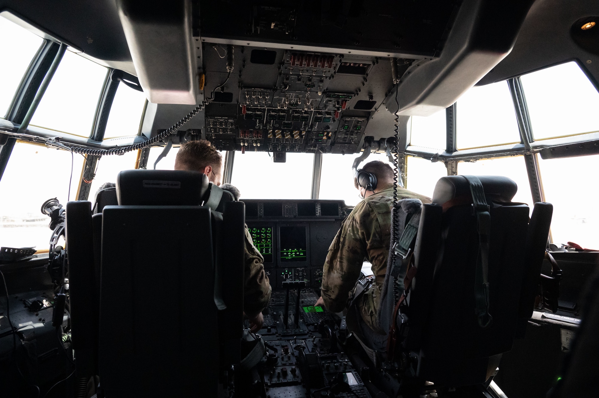 U.S. Air Force pilots assigned to the 40th Airlift Squadron conduct preflight checks on a C-130J within the U.S. Central Command area of responsibility, June 6, 2025. The 40th AS mission includes transporting personnel, equipment, and supplies and supporting humanitarian and contingency operations across the globe. (U.S. Air Force photo by Senior Airman Dieondiere Jefferies)